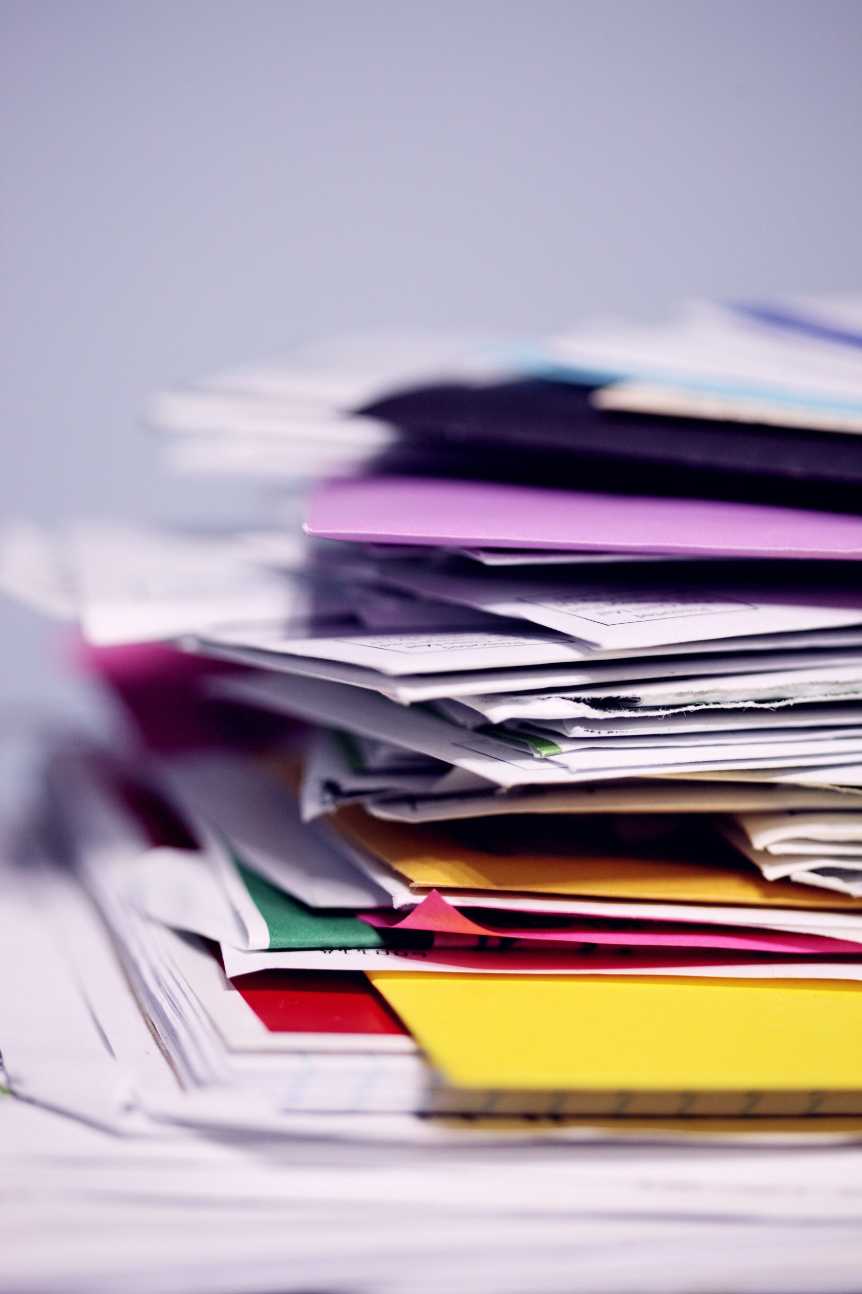 stack of file folders on desk